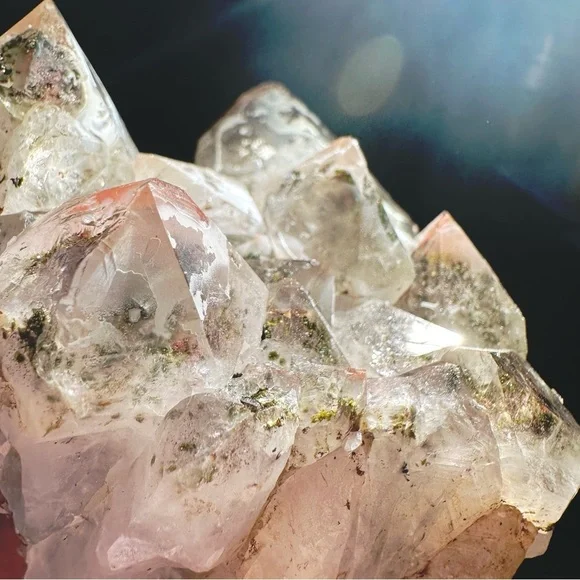 Large quartz, amethyst, and epidote combo with phantoms terminations red quartz